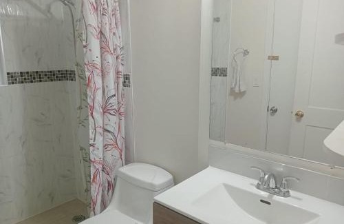 Surrey Newton Casa | Family Room with Attached Bathroom at King George Boulevard- Restaurants, Shopping, Transit at Walking Distance KG3