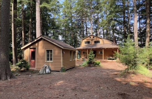 Belgrade Casa | Famous cottage directly on 100' private shoreline of pristine lake.