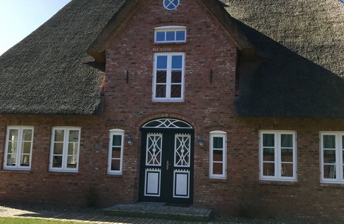 Oldsum Casa | Fantástica casa de vacaciones con techo de paja en Föhr