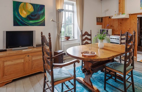Burum Apartamento | Casa rural en Lauwers con barco de remos