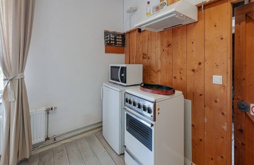 Burum Apartamento | Casa rural en Lauwers con barco de remos