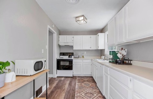 Prairie Village Casa | Feel at home in this charming house on a quiet street