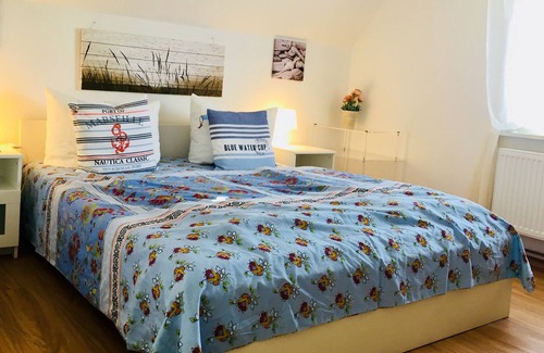 Wulfen Apartamento | Fehmarn - beach at 500m, modern apartment, enclosed Garden, balcony, sea view, dog