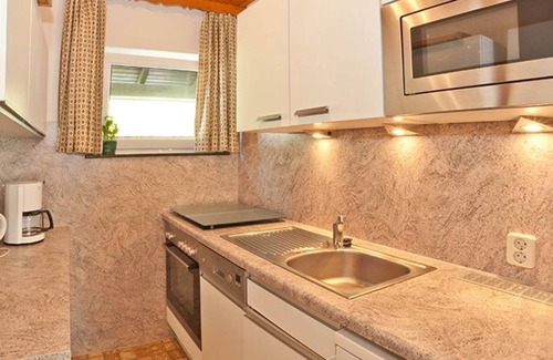 Schwarzenbach Casa | Ferienhaus 42-f mit gut Ausgestatter Küche und Garage - Ferienhäuser im Feriendorf Weissensee im