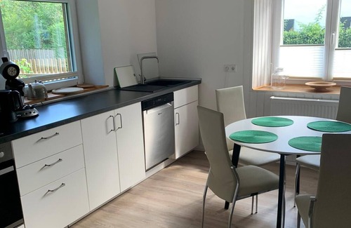 Laugna Casa | Ferienhaus am Bach