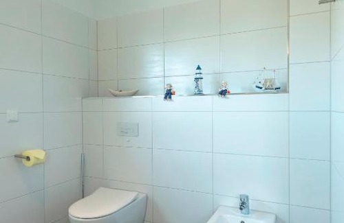 Gohren Casa | Ferienhaus Corvin mit eingezäunten Grundstück (200 m²)