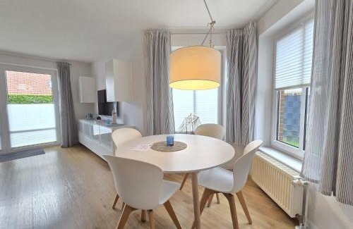 Neßmersiel Casa | Ferienhaus Heimathafen zentral in Neßmersiel eingezäunt, Hund Willkommen