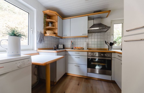Eslohe Casa | Ferienhaus in Ortsrandlage mit Aussensauna und Beleuchteter Glasüberdachung