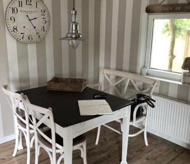Onderdijk Apartamento | Ferienhaus Tami direkt am Wasser mit eigenem Bootsanlegesteiger