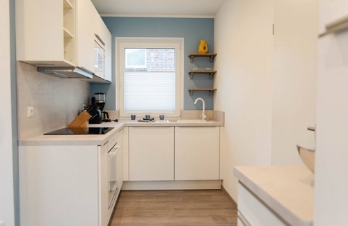 Tannenhausen Casa | Ferienhaushälfte Wasserseite - Küsten Apartments Tannenhausen