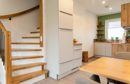 Tannenhausen Casa | Ferienhaushälfte Wasserseite - Küsten Apartments Tannenhausen