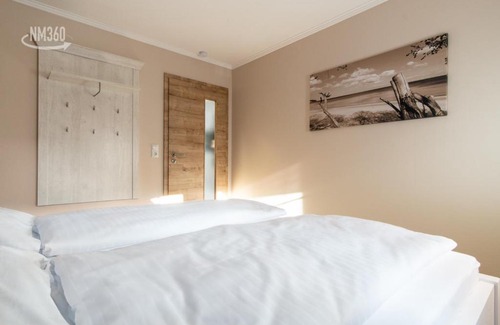 Monchgut-Granitz Apartamento | Ferienwohnanlage ODINs Blick - Wohnung 17 - direkt am Privatstrand, mit Sauna, Garten