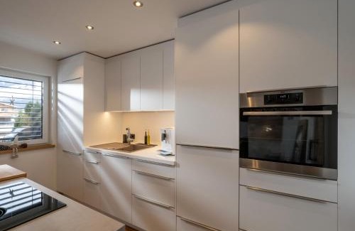 Sankt Johann in Tirol Apartamento | Ferienwohnung Tirolglück mit großem Garten