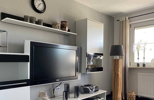 Osteel Apartamento | Ferienwohnung Am Alten Deich mit Balkon