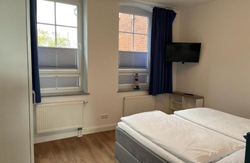 Schonberg Apartamento | Ferienwohnung am Hotel am Rathaus