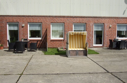 Poppenbull Apartamento | Ferienwohnung auf dem Ferienhof Nickelswarft 2 in Poppenbüll für 2-6 Personen