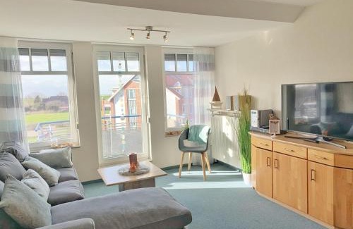 Dorumer Neufeld Apartamento | Ferienwohnung dat Stürboord mit Schwimmbad und Sauna