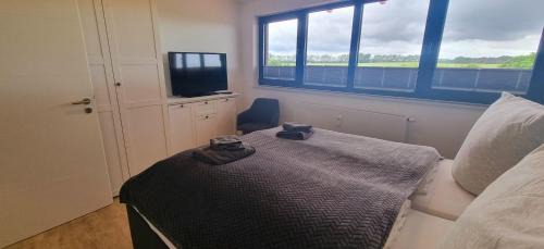 Hohen Wieschendorf Apartamento | Ferienwohnung "Weitblick No 36 - Aurora Vista"