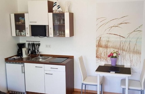 Neuharlingersiel Apartamento | Ferienwohnung Kleine Krabbe 1