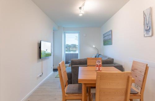 Norderhafen Apartamento | Ferienwohnung "Halligstork" direkt am Nordseedeich mit Blick auf den See