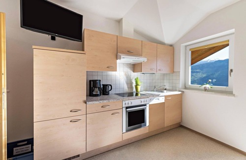 Schwendau Apartamento | "Ferienwohnung Jakob" Cerca de las estaciones de esquí de Penken y Ahorn con vistas a la montaña