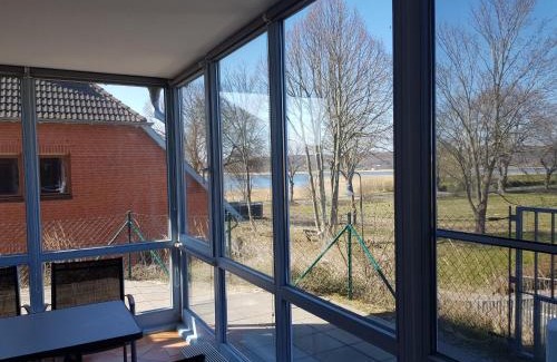 Neuensien Complejo | Ferienwohnung Mönchgut 1 mit Wintergarten und Terrasse
