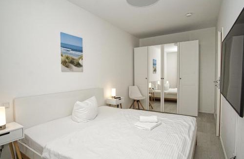 Gross Zicker Apartamento | Ferienwohnung mit eigener Sauna und Terrasse- Haus Inselwind FeWo MEERfamilie