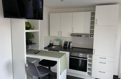 Bemerode Apartamento | Ferienwohnung mit Fußbodenheizung nahe Messe, gratis Parkplatz und Abstellplatz E - Bike
