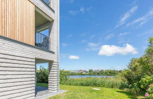 Norderhafen Apartamento | Ferienwohnung Nord-West - direkt am Nordseedeich mit Blick auf den See