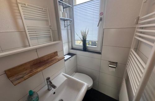 Sudstadt Apartamento | Ferienwohnung NORDLICHT mit Balkon und Smart-TV