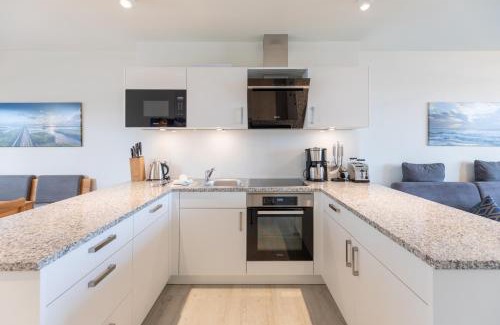 Norderhafen Apartamento | Ferienwohnung Nordseetraum direkt am Nordseedeich mit Blick auf den See