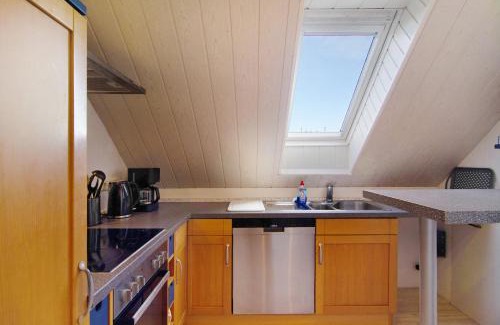 Halbemond Apartamento | Ferienwohnung Rocker
