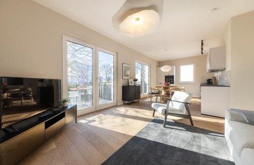 Warnemuende Apartamento | Ferienwohnung Strom Acht - modern frisch inkl Stellplatz, Balkon - 200m zum Alten Strom