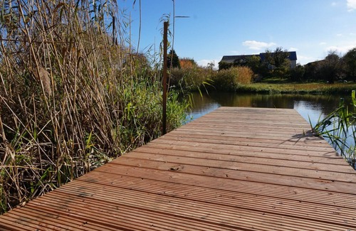 Bad Freienwalde Apartamento | Fewo EG am Fluss mit Terrasse - Eine Grüne Oase