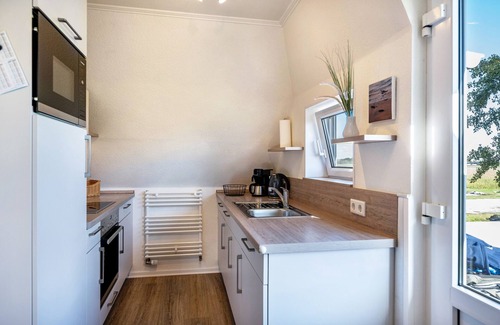 Pellworm Apartamento | Apartamento 'Ferienwohnung Flut' con terraza compartida, jardín compartido y Wi-Fi
