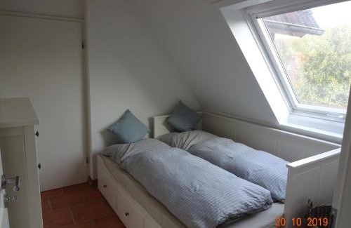 Westerdeichstrich Apartamento | Fewo Schröder - BUDE 63a - mit Strandkorb am Meer - inklusive Bettwäsche und Handtücher