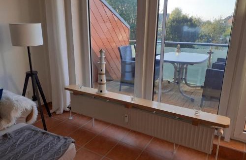 Westerdeichstrich Apartamento | Fewo Schröder - BUDE 63a - mit Strandkorb am Meer - inklusive Bettwäsche und Handtücher