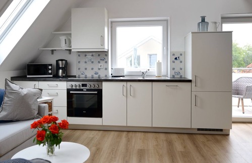 Toenning Apartamento | FeWo Solskin - Sobre los tejados de Tönnings