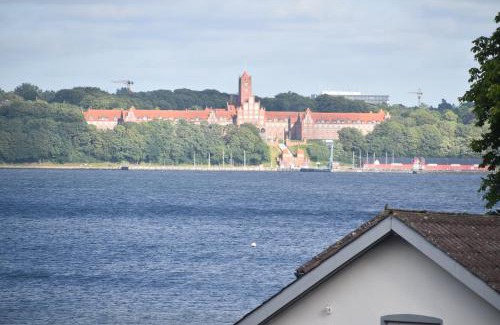 Wassersleben Apartamento | fewo1846 Strandresidenz Wassersleben - Fjordblick - modernes Studioapartment mit Balkon und Meerblick