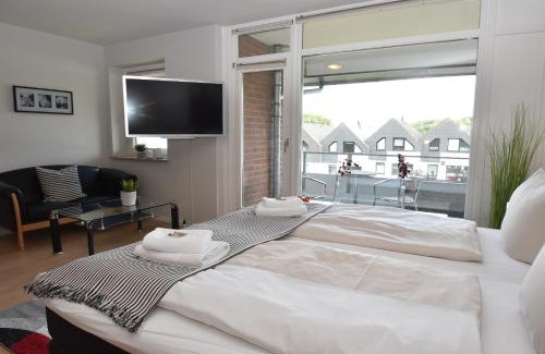 Wassersleben Apartamento | fewo1846 Strandresidenz Wassersleben - Fjordblick - modernes Studioapartment mit Balkon und Meerblick