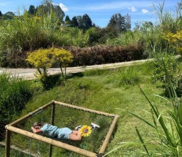 Guarne Casa | Finca Acogedora con Área de BBQ, Parking Privado y Hamacas