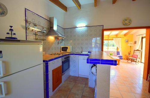 Llubi Casa | Finca S'estable is a cozy family vacation home with a swimming pool.