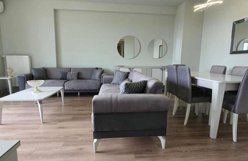 Buyukcekmece Apartamento | FIRST AVENUE 2 bedrooms, Livingroom with a charming sea view
