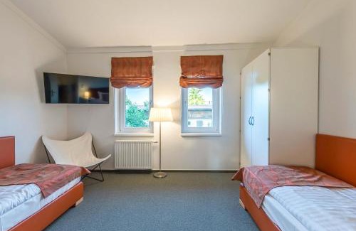Muritz Apartamento | Fischadler - Ferienwohnung mit Terrasse, Kamin, Bootsverleih & Seezugang
