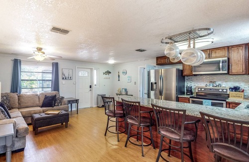 Ruskin Casa | Fishing getaway with a pool, hot tub, game room, dock, and grill - dog-friendly