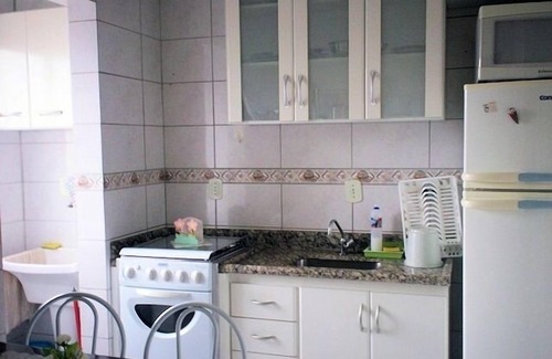 Caicara Apartamento | Ajuste en Vila Caiçara en Praia Grande para 6 personas. IMPECABLE