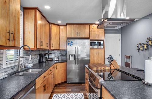Gravois Mills Casa | Five Oaks Lakehouse - Luxurious Home with a Game Room and Lakeside Fire Pit!