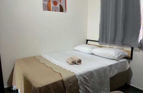 Jardim Ipe Apartamento | Flat com ar e varanda com linda vista para o Ibituruna - Vôo Livre 203