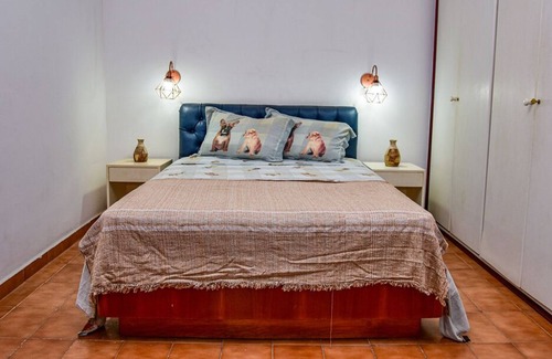 Morro do Maluf Apartamento | Flat c varanda na Praia de Pitangueiras-Guarujá/SP