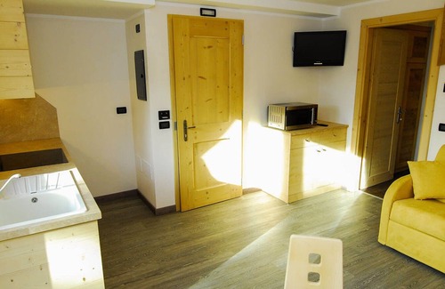 Teola Apartamento | Piso Mont dala Nef - Baita Cusini con vistas a la montaña, zona de spa y Wi-Fi